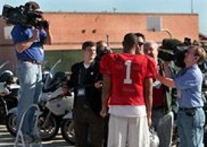 Media swarm BCS coaches, players 
