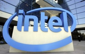 Intel profit meets subdued forecasts; revenue hits record 