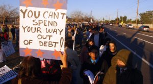 More than 500 protest Obama's arrival 