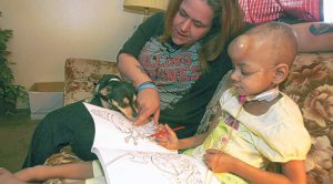 Rescued dog helps Mesa girl deal with cancer 