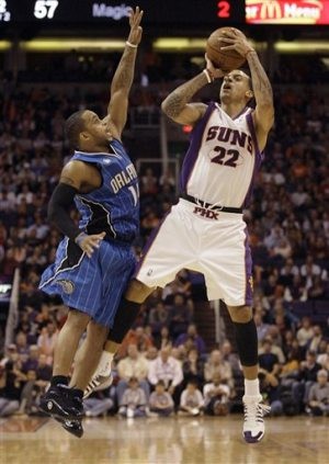 Suns work late Magic to win 
