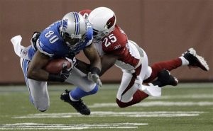 Cards hold off Lions, clinch NFC West 
