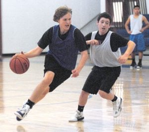 JOY ON THE COURT: New coach builds boys basketball program 