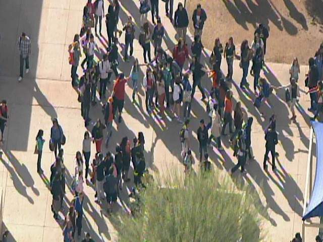 Westwood students hold hands to support principal's decision about punishment