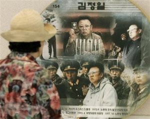 N. Korea boots inspectors, vows to restart reactor 
