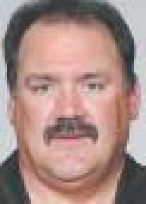 Cards hire Grimm as assistant head coach 