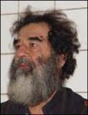 Iraqis get custody of Saddam, 11 others 