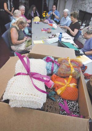 Shawls knitted in love spread from Mesa to wide world 