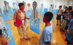 Museum helpers give tours, explain art and get great schooling in the process 