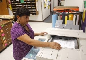 Parents give to offset school budget cuts 