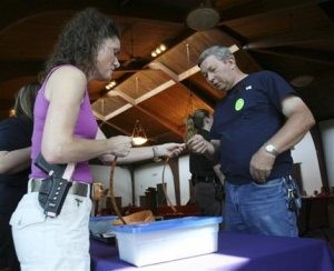 Pastor welcomes guns, their owners to church 