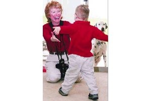 Photographer develops keys to photographing special needs children 