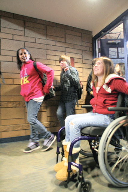 Mackenzie Saunders returns to school 