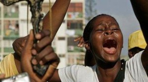 Pope urges Angolans to convert; stampede kills 2 