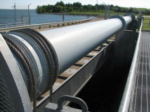 Hinged crest gates, electric operation