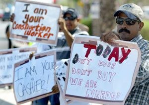 Immigrants protest employer sanctions law 