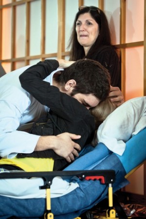 Mother and son share an embrace
