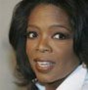 Oprah gives audience members debit cards 
