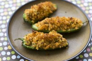 <p>In this image taken on May 20, 2013, cheesy sausage-stuffed jalapeno peppers are displayed in Concord, N.H. (AP Photo/Matthew Mead)</p>
