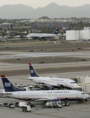 US Airways posts quarterly loss 