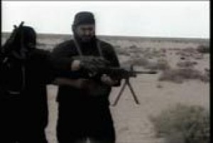 Video shows al-Zarqawi fumbling with rifle 