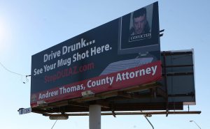 Ad critics rap county attorney’s high profile 