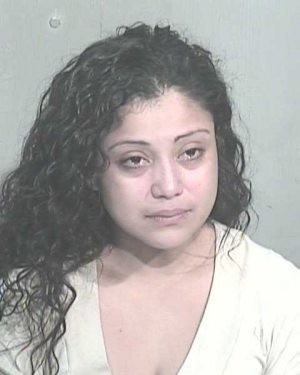 Woman arrested in stabbing death 