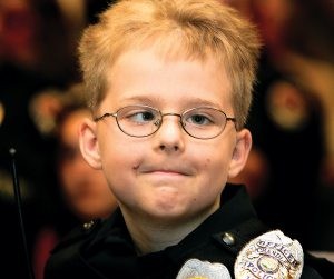 Honorary policeman, 9, loses brain tumor battle 
