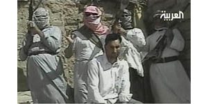 Captors say Marine, Pakistani held in Iraq 