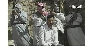 Captors say Marine, Pakistani held in Iraq 