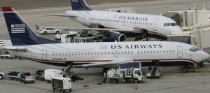 US Airways posts quarterly loss 