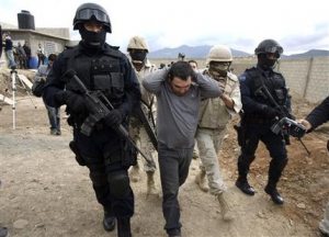 Top Mexico cops charged with favoring drug cartel 