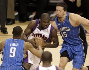 Suns work late Magic to win 