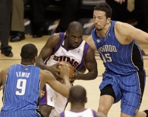 Suns work late Magic to win 