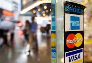 Fed: Banks eye tighter terms on credit cards 