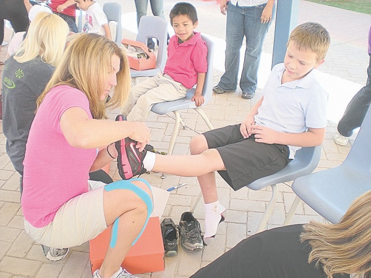 Aguilar Elementary students get new shoes