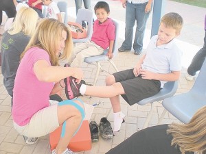 Aguilar Elementary students get new shoes