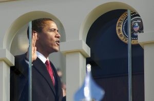 Obama takes office, appeals for 'hope over fear' 