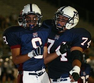 Which city’s H.S. football teams are undefeated? 