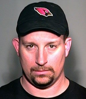 Cards fans arrested in burning McNabb's lawn 