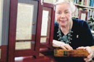 E.V. woman splits first-edition Book of Mormon 