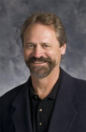 Prof wanted in killings found dead in woods 