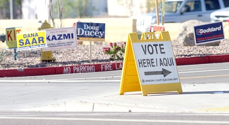 Vote here sign