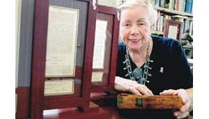 E.V. woman splits first-edition Book of Mormon 