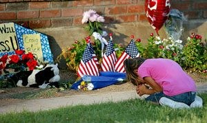 Mourners gather near crash site to honor news crews 