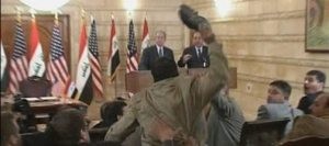 Journalist hurls shoes at President Bush during Iraq visit 