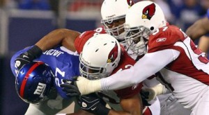 Cardinals' defense beats back Giants 