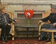 Clinton meets with Karzai, U.S. troops 