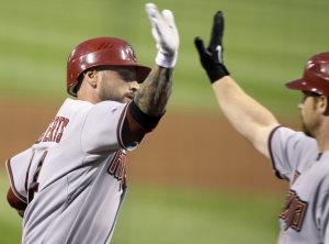 Drew helps streaking Arizona rally for win 