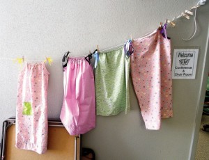 Girl Scouts make dresses for Swaziland